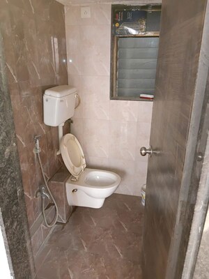 Bathroom in 1 BHK Apartment at Mira Nagar – for Sale