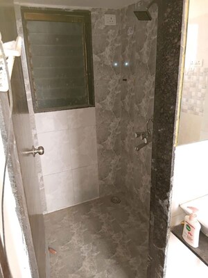 Bathroom in 1 BHK Apartment at Mira Nagar – for Sale