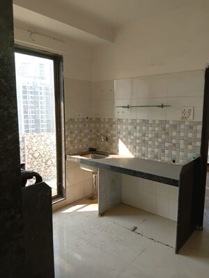 Kitchen in 1 BHK Apartment at Mira Nagar – for Sale