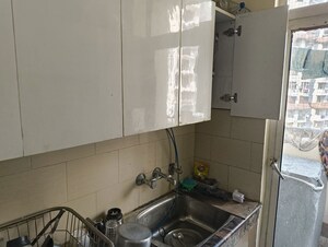 Kitchen in 2 BHK Apartment at Mahagun Mahagunpuram II, Lal Kuan – for Sale