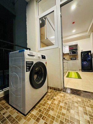 Laundry Area in 3 BHK Apartment at Omaxe The Palace, Gomti Nagar – for Rent