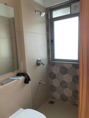 Bathroom in 2 BHK Apartment at Kalpataru Sunrise Grande, Kolshet Road – for Rent