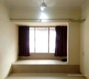 Room in 1 BHK Apartment at Raheja Township, Malad East – for Rent
