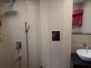 Bathroom in 1 BHK Apartment at Raheja Township, Malad East – for Rent