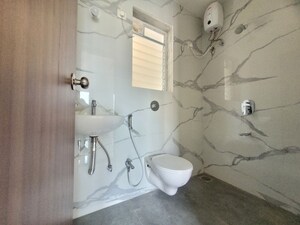Bathroom in 2 BHK Apartment at Godrej Emerald, Ghodbunder Road – for Rent