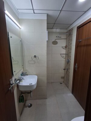 Bathroom in 3 BHK Builder Floor at Central Park Flower Valley, Sohna Sector 33 – for Rent