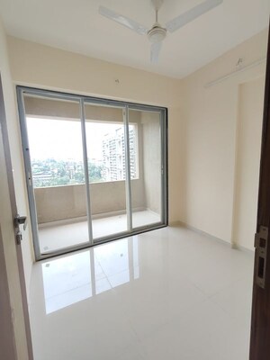 Room in 2 BHK Apartment at Mohan Precious Greens, Ambernath – for Rent