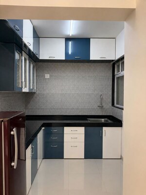 Kitchen in 1.5 BHK Apartment at Gagan Micasaa, Wagholi – for Rent