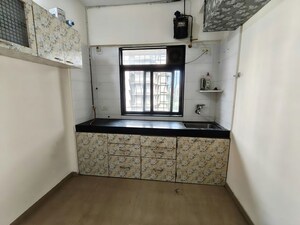 Kitchen in 1 BHK Apartment at Raunak Heights, Ghodbunder Road – for Rent