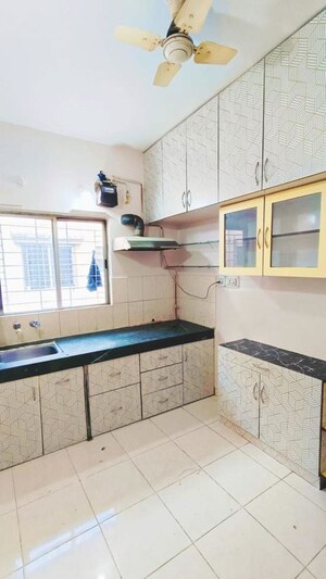 Kitchen in 2 BHK Apartment at Moraya Raj Park, Chinchwad – for Rent