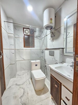 Bathroom in 2 BHK Builder Floor at Chattarpur – for Sale