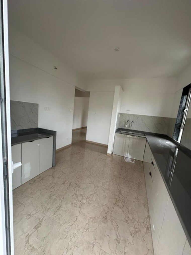 Kitchen, northcape-venicia 2 Bedroom 932 Sq.Ft. Apartment In Baner Pune 10689977