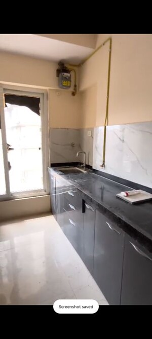 Kitchen in 1 BHK Apartment at Ruparel Elara, Kandivali West – for Rent