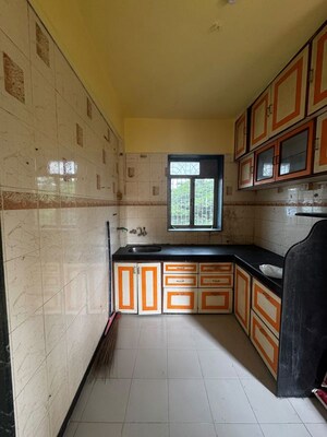 Kitchen in 2 BHK Apartment at Naupada – for Sale