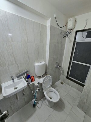 Bathroom in 2 BHK Apartment at Puranik City Reserva, Ghodbunder Road – for Rent