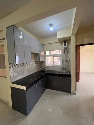 Kitchen in 2 BHK Apartment at Signature Global Orchard Avenue, Sector 93 – for Rent