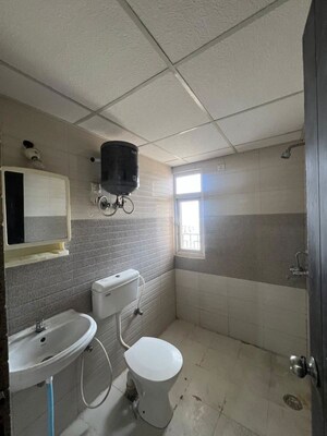 Bathroom in 2 BHK Apartment at Signature Global Orchard Avenue, Sector 93 – for Rent