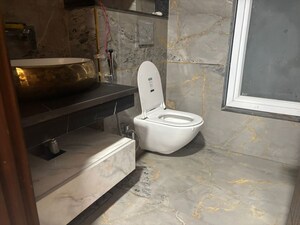 Bathroom in 3 BHK Builder Floor at DLF Alameda Independent Floors, Sector 73 – for Rent