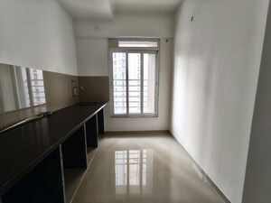 Kitchen in 1 BHK Apartment at Puranik Rumah Bali, Ghodbunder Road – for Rent