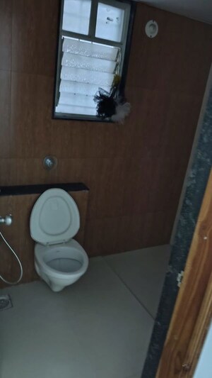 Bathroom in 2 BHK Apartment at Kunal Iconia, Mamurdi – for Sale