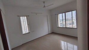 Bedroom in 2 BHK Apartment at Kunal Iconia, Mamurdi – for Sale