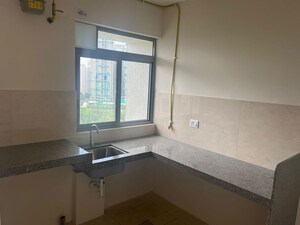 Kitchen in 1 BHK Apartment at Piramal Vaikunth, Balkum Pada – for Rent
