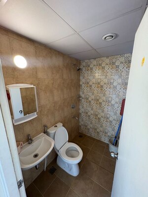 Bathroom in 1.5 BHK Apartment at Brigade El Dorado, Bagaluru – for Rent
