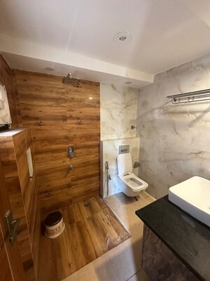 Bathroom in 3 BHK Apartment at Freedom Fighters Enclave – for Rent
