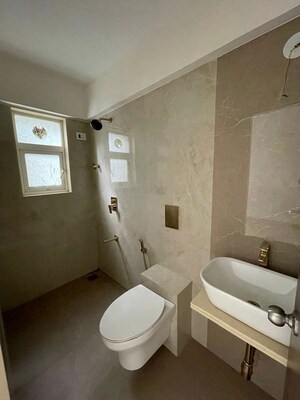 Bathroom in 4 BHK Apartment at Our Home CHS, Andheri West – for Sale
