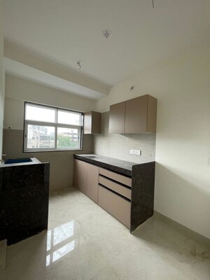 Kitchen in 4 BHK Apartment at Our Home CHS, Andheri West – for Sale