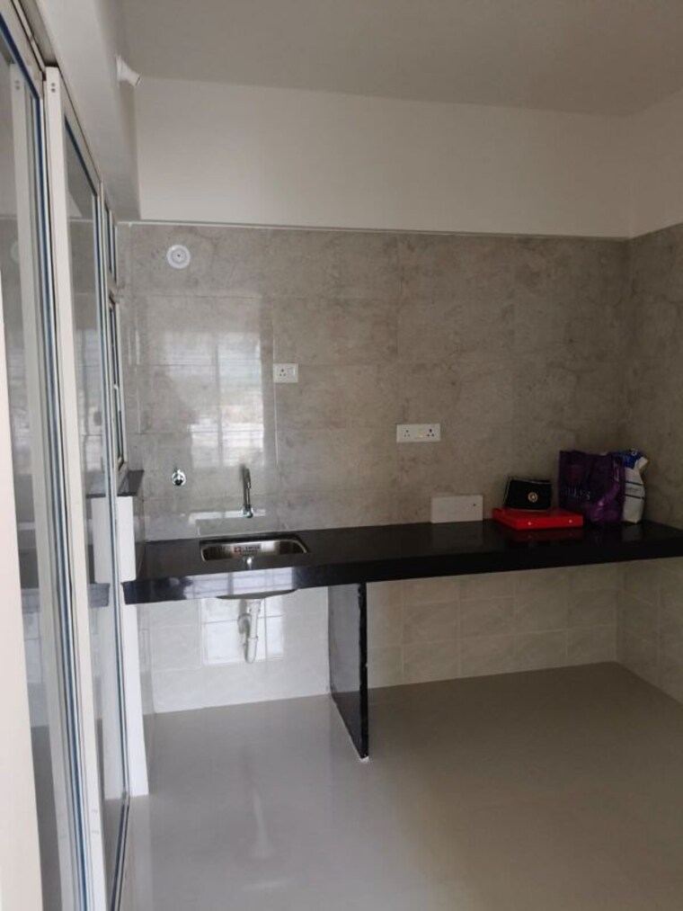 Kitchen, rama-livmo 2 Bedroom 640 Sq.Ft. Apartment In Hinjewadi Pune 10689042