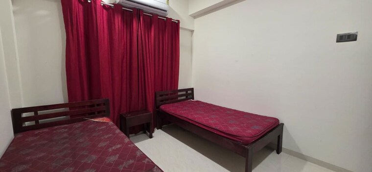 Bedroom, earth-terrace Pg For Girls In Goregaon West 10690518