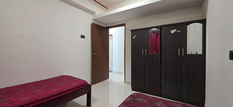 Bedroom, earth-terrace Pg For Girls In Goregaon West 10690518