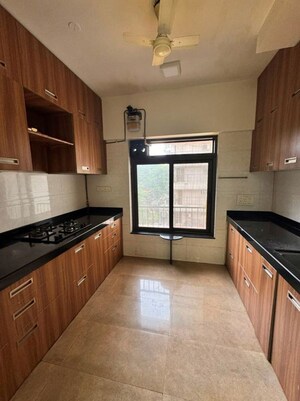 Kitchen in 3 BHK Apartment at Nav Palmyra Apartment, Khar West – for Rent