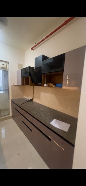 Kitchen in 2 BHK Apartment at Piramal Vaikunth, Balkum Pada – for Rent