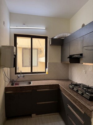 Kitchen in 3 BHK Apartment at Shalimar Mannat, Faizabad Road – for Rent
