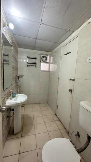 Bathroom in 2.5 BHK Apartment at Gaur City 7th Avenue, Sector 4 Greater Noida – for Rent