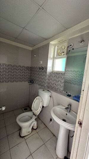 Bathroom in 2.5 BHK Apartment at Gaur City 7th Avenue, Sector 4 Greater Noida – for Rent