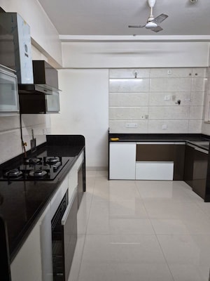 Kitchen in 3 BHK Apartment at Kundan Spaces Emirus, Baner – for Rent