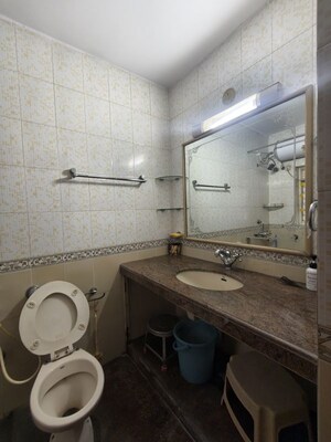 Bathroom in 2 BHK Apartment at Harshvardhan CHS Powai, Powai – for Rent