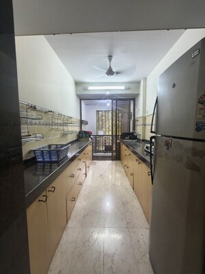 Kitchen in 2 BHK Apartment at Harshvardhan CHS Powai, Powai – for Rent