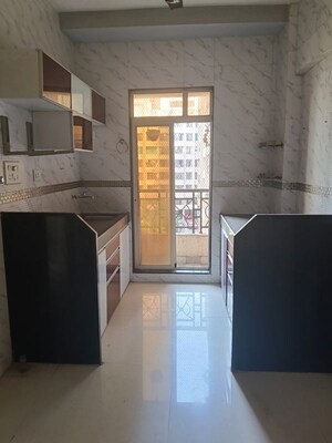 Kitchen in 2 BHK Apartment at Agarwal Lifestyle, Virar West – for Rent