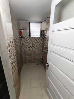 Bathroom in 2 BHK Apartment at Matunga West – for Rent
