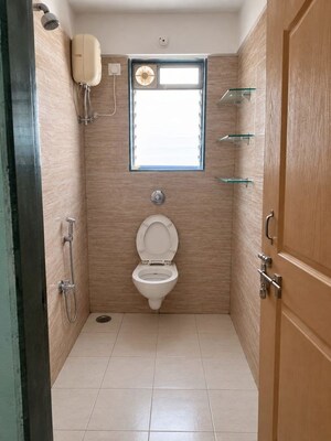 Bathroom in 3 BHK Apartment at Shivgiri CHS, Mulund West – for Sale