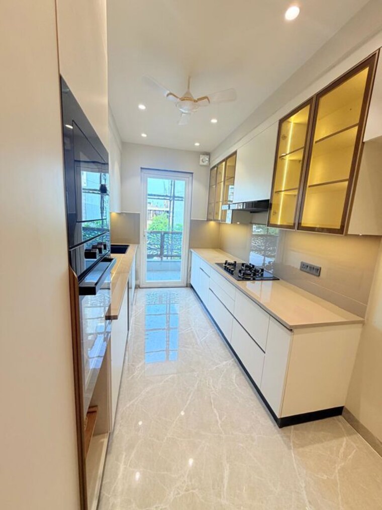 Kitchen, ansal-api-versalia 4 Bedroom 270 Sq.Yd. Builder Floor In Sector 67a Gurgaon 10690900