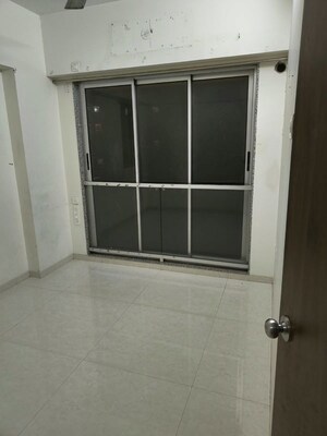 Room in 2 BHK Apartment at Naman Premier, Andheri East – for Sale