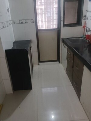 Kitchen in 2 BHK Apartment at Sanskruti Vrushi, Borivali West – for Rent