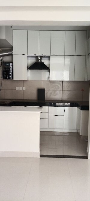 Kitchen in 3 BHK Apartment at Tata Eureka Park, Sector 150 – for Rent