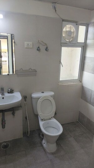 Bathroom in 2 BHK Apartment at High End Paradise II, Raj Nagar Extension – for Sale