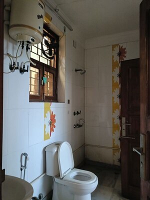 Bathroom in 3 BHK Builder Floor at Sukhdev Vihar – for Rent
